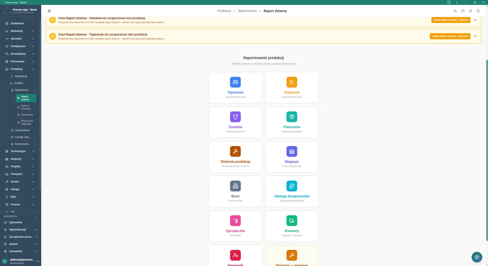 Ekran Raport dzienny w module Produkcja, wyświetlający powiadomienia o braku raportów oraz kafelki do wyboru obszaru raportowania pracy.